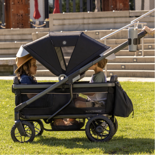 Image of two kids in Shyft Rideshare in stroller mode