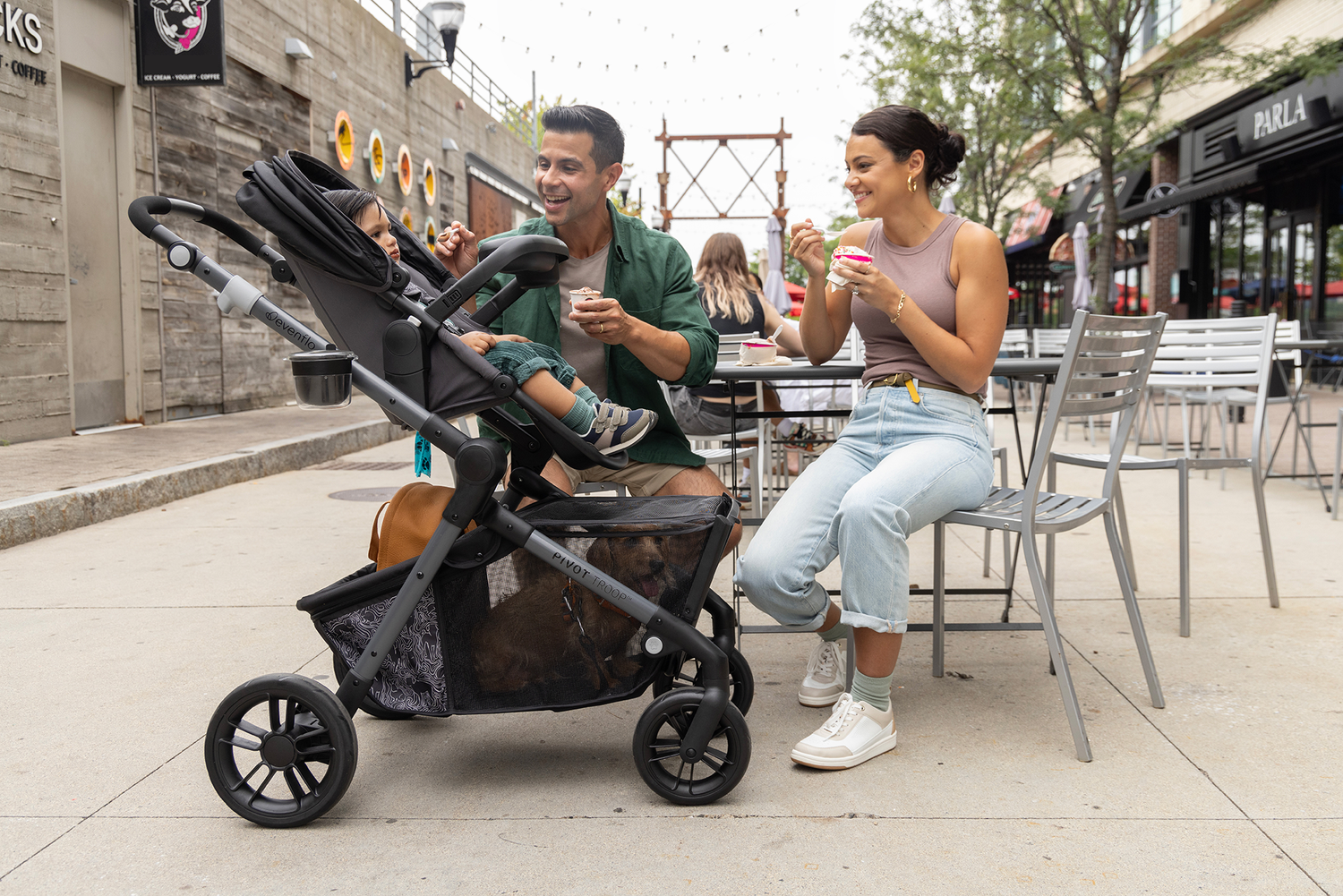 Image of mom and dad smiling at child in Pivot Troop