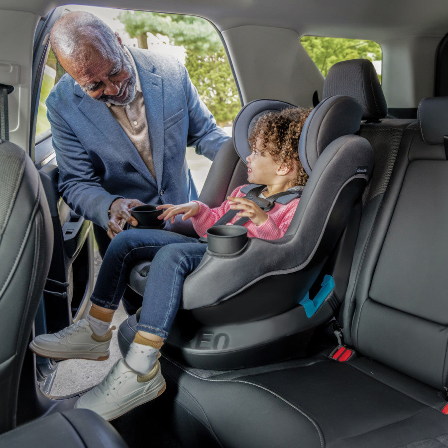 REO by Revolve360 Rotational Convertible Car Seat inside