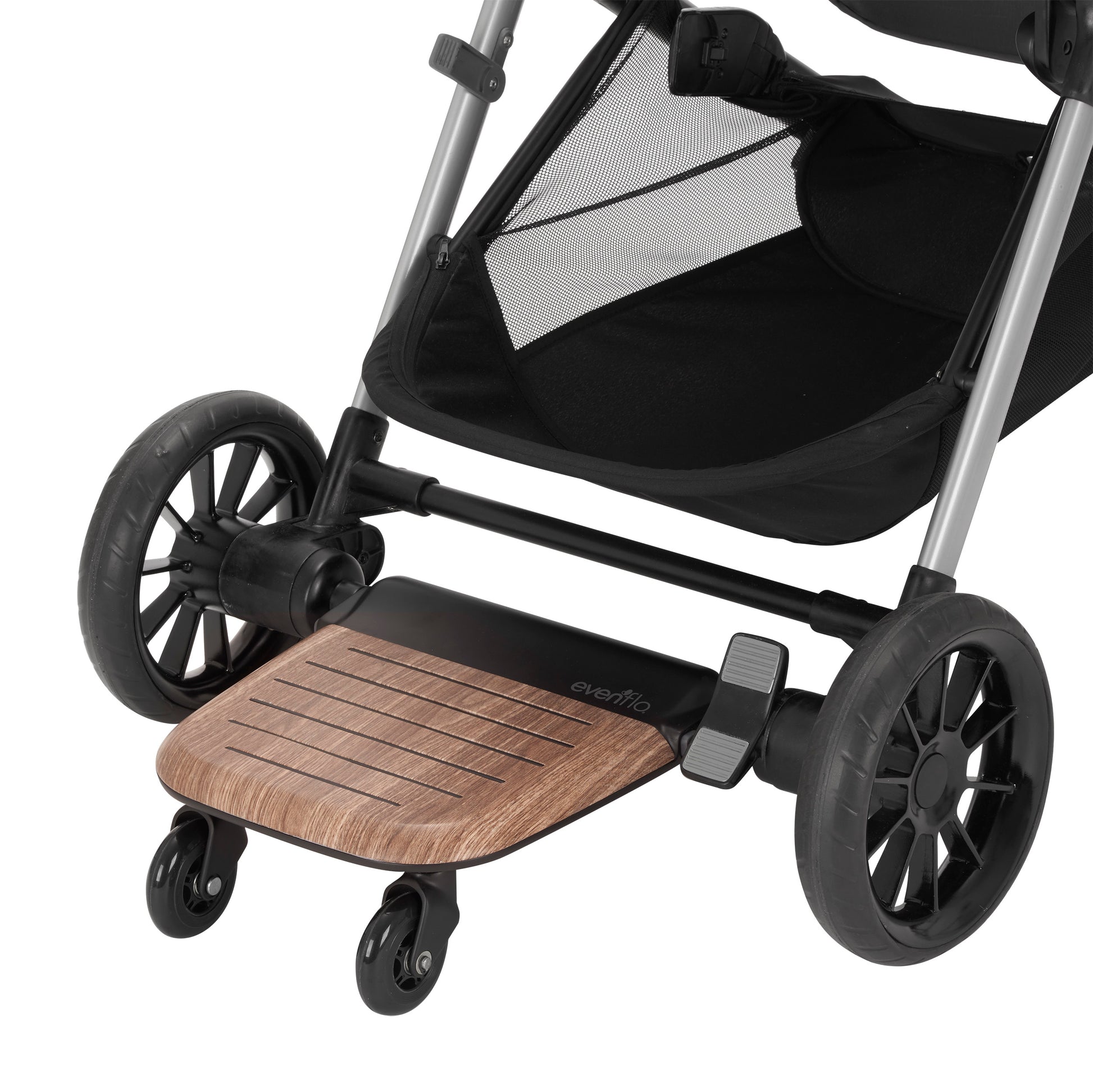Evenflo stroller rider board attached to the back of a stroller