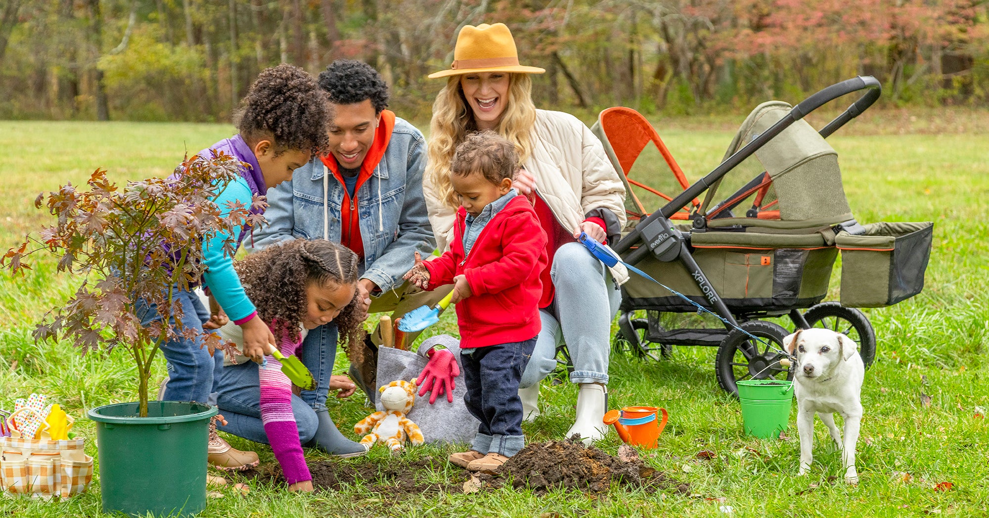 Family planting a tree