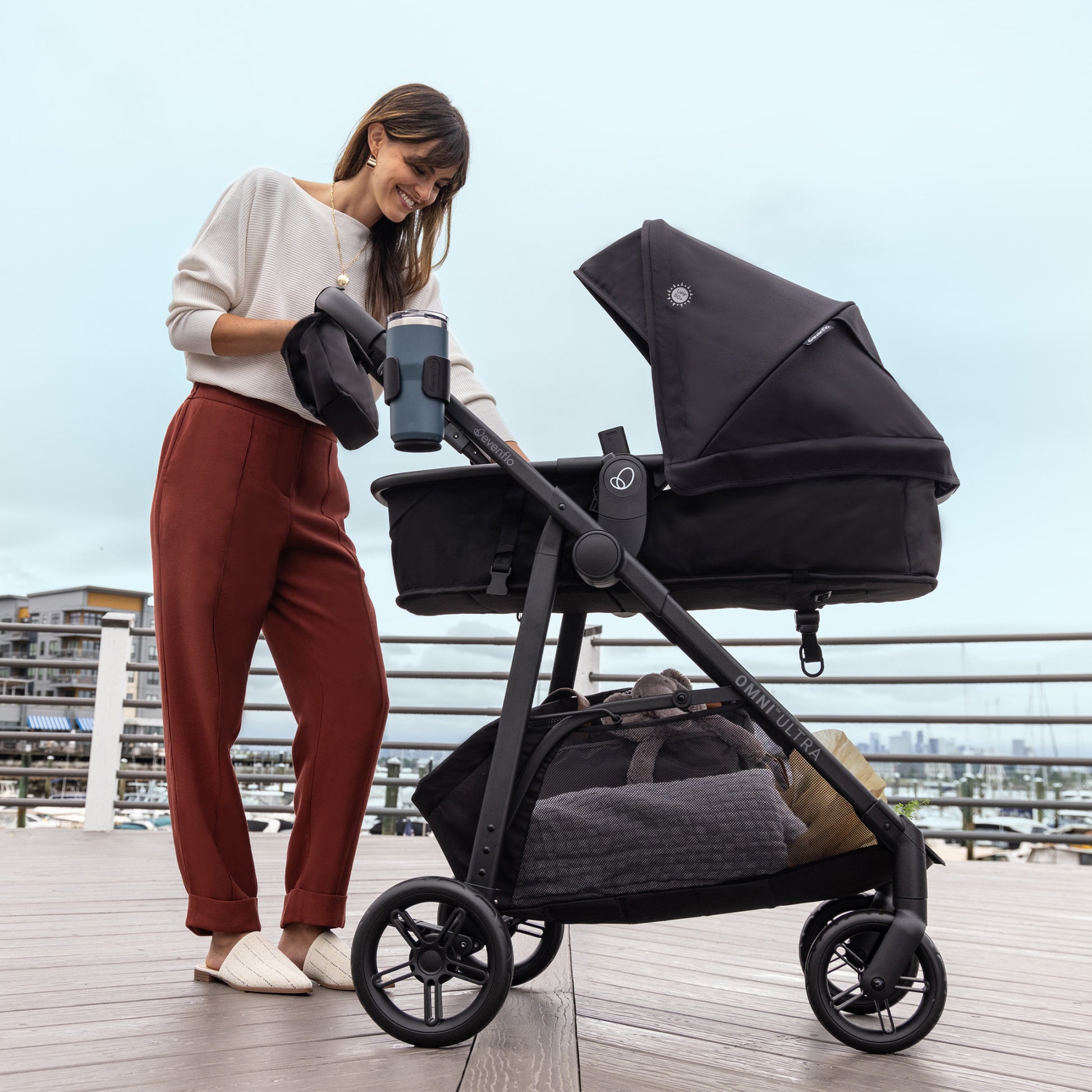 Omni Ultra Travel System with Revolve180 LiteMax NXT Rotational Infant Car Seat Caviar Black outside