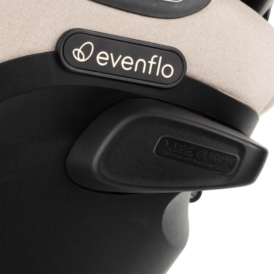 Revolve360 Extend All-in-One Rotational Car Seat with Green & Gentle Fabric back logo