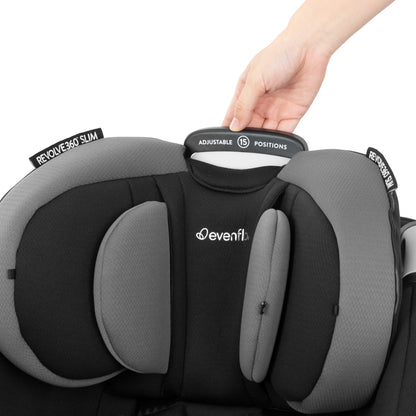 Gold Revolve360 Slim 2-in-1 Rotational Car Seat with SensorSafe Obsidian Black adjust button