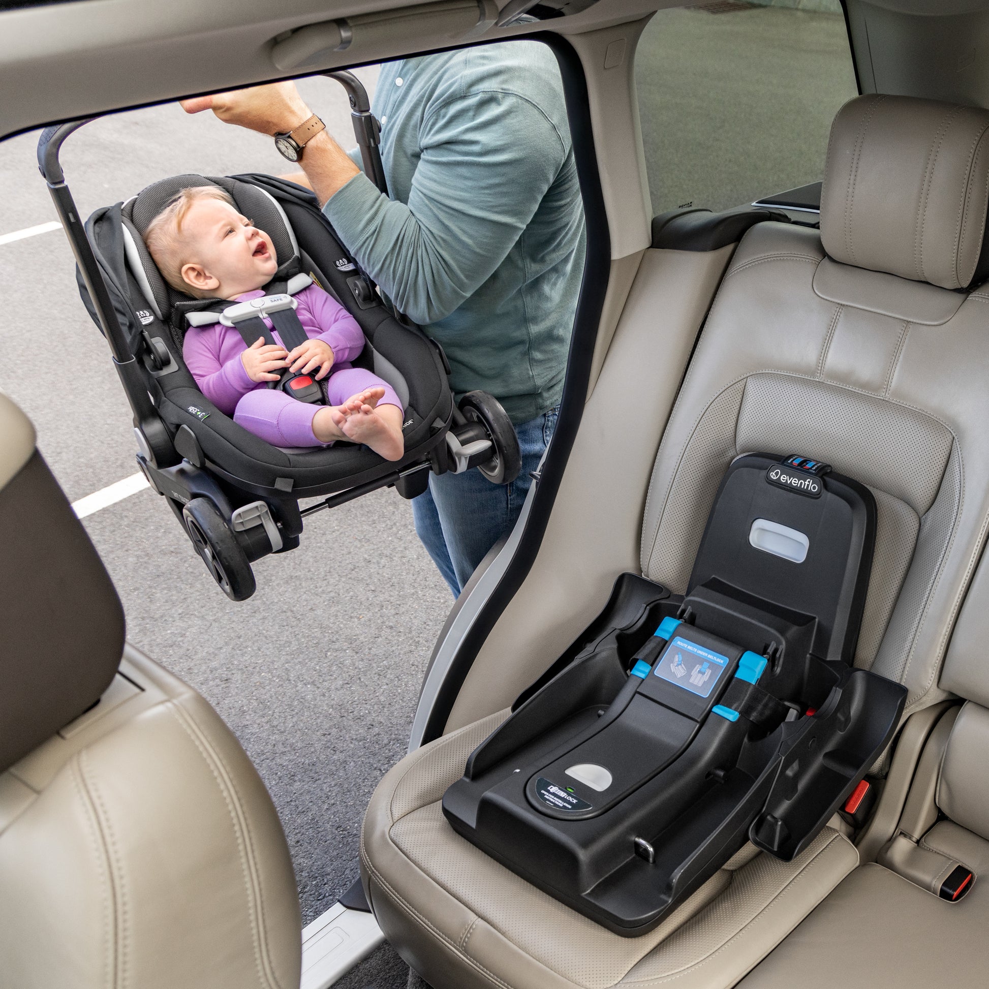 https://www.evenflo.com/cdn/shop/products/37312473_27_Core_Plus_Shyft_DualRide_Infant_Car_Seat_and_Stroller_Combo_with_Carryall_Storage_Bag_Boone_Lifestyle_ICS_Load_Car.jpg?v=1697832980&width=1946